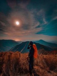 A mountain climber and the beauty around him