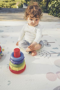 Cute girl playing with toy