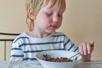 Close-up of boy eating food