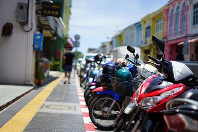 Close-up of motorcycle against sky