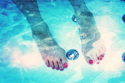 Close-up of man swimming in pool