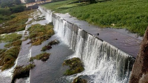 High angle view of dam by river