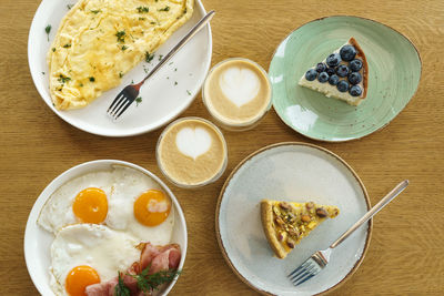 High angle view of breakfast served on table