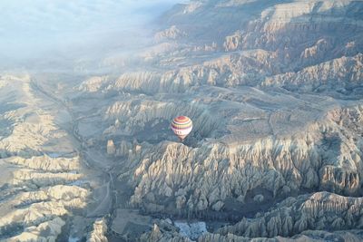 High angle view of hot air balloon flying over cappadocia