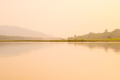 Scenic view of lake against clear sky