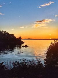 Scenic view of calm sea at sunset