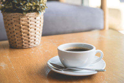 Close-up of coffee cup on table