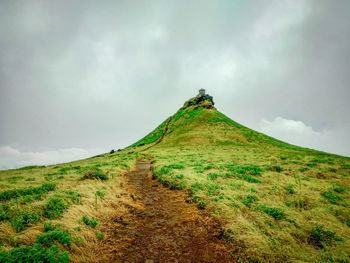 Scenic view of land against sky