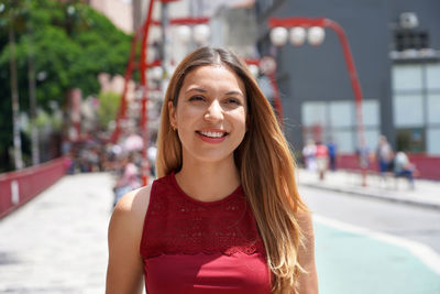 Close-up of beautiful woman walking in sao paulo neighborhood liberdade, brazil, south america