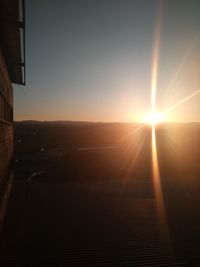 Scenic view of landscape against sky during sunset