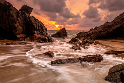 Scenic view of sea against sky during sunset