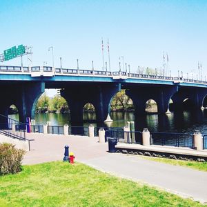 Bridge over river against clear sky