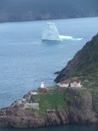 Scenic view of sea and buildings