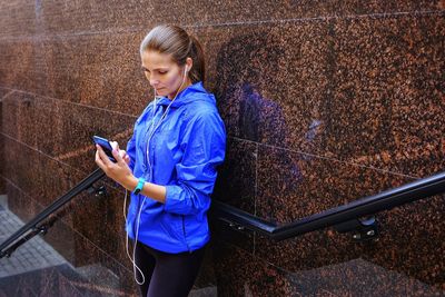 High angle view of woman using mobile phone