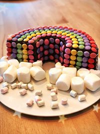 Close-up of multi colored candies on table