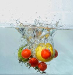 Directly above shot of tomatoes in water