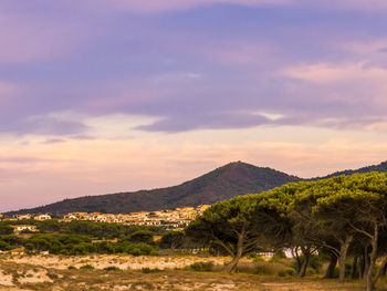 Scenic view of mountains against sky during sunset