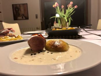 Close-up of breakfast served on table at home