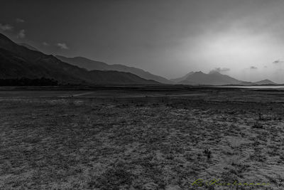 Scenic view of desert against sky