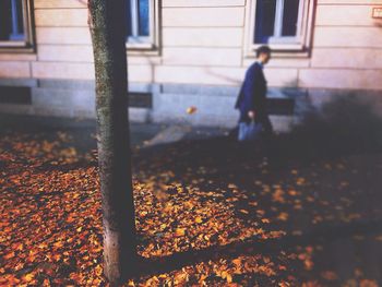 Woman standing in front of building