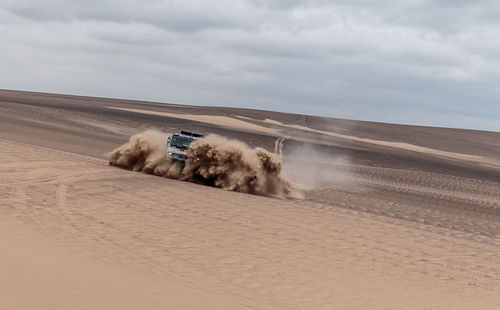 Scenic view of desert against sky