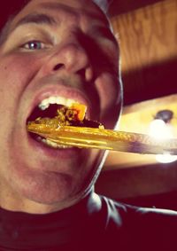 Close-up of woman eating food