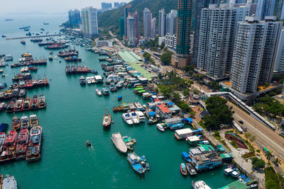 High angle view of cityscape by sea