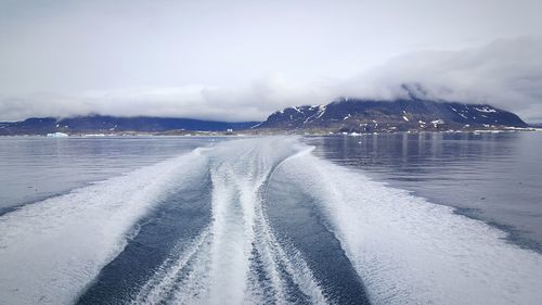 Scenic view of sea against sky during winter