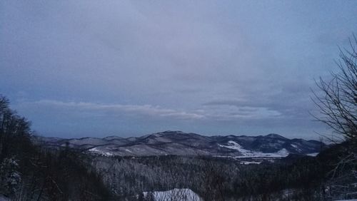 Scenic view of mountains against sky