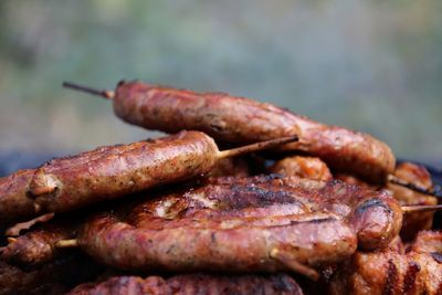 Close-up of meat on barbecue grill