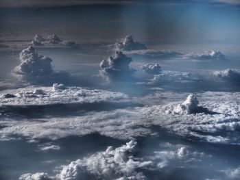 Aerial view of clouds in sky during winter