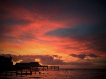 Scenic view of sea against sky at sunset