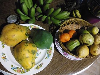 High angle view of fruits in plate on table