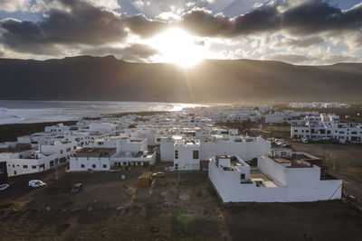 High angle view of townscape against sky during sunset