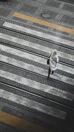 Rear view of woman walking on staircase