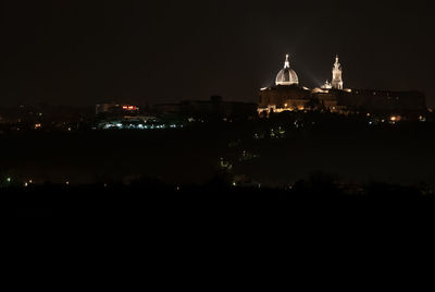 Illuminated city at night