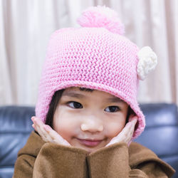 Portrait of cute baby girl at home