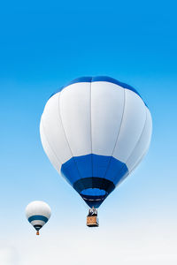 Hot air balloons flying in sky