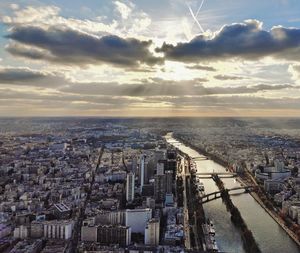 High angle view of city against sky during sunset