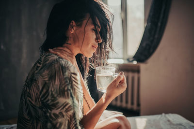 Young woman using mobile phone