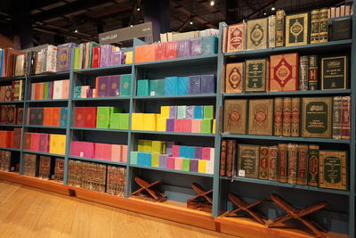 Multi colored books in shelf at store