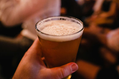 Close-up of woman holding drink