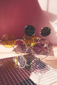 Close-up of sunglasses on table