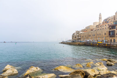 Old jaffa port and tel-aviv in fog time