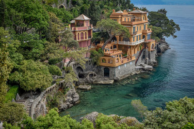 View of buildings by sea