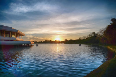 Scenic view of lake against sky during sunset