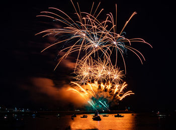 Firework display at night