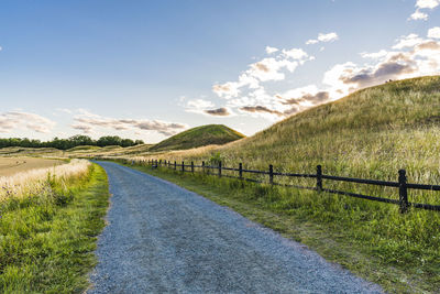 Hilly landscape with dirt road