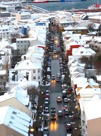 High angle view of buildings in city during winter