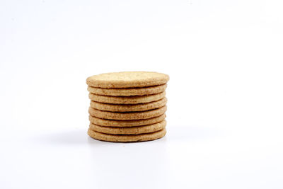 Close-up of stack against white background